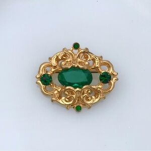 Vintage open back green glass stone brooch